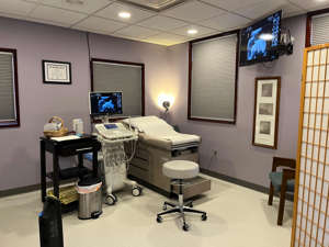 A patient room and an ultrasound machine at Women's Choice Center, an anti-abortion pregnancy resource center in Bettendorf that could receive state dollars under a bill making its way through the state Legislature.