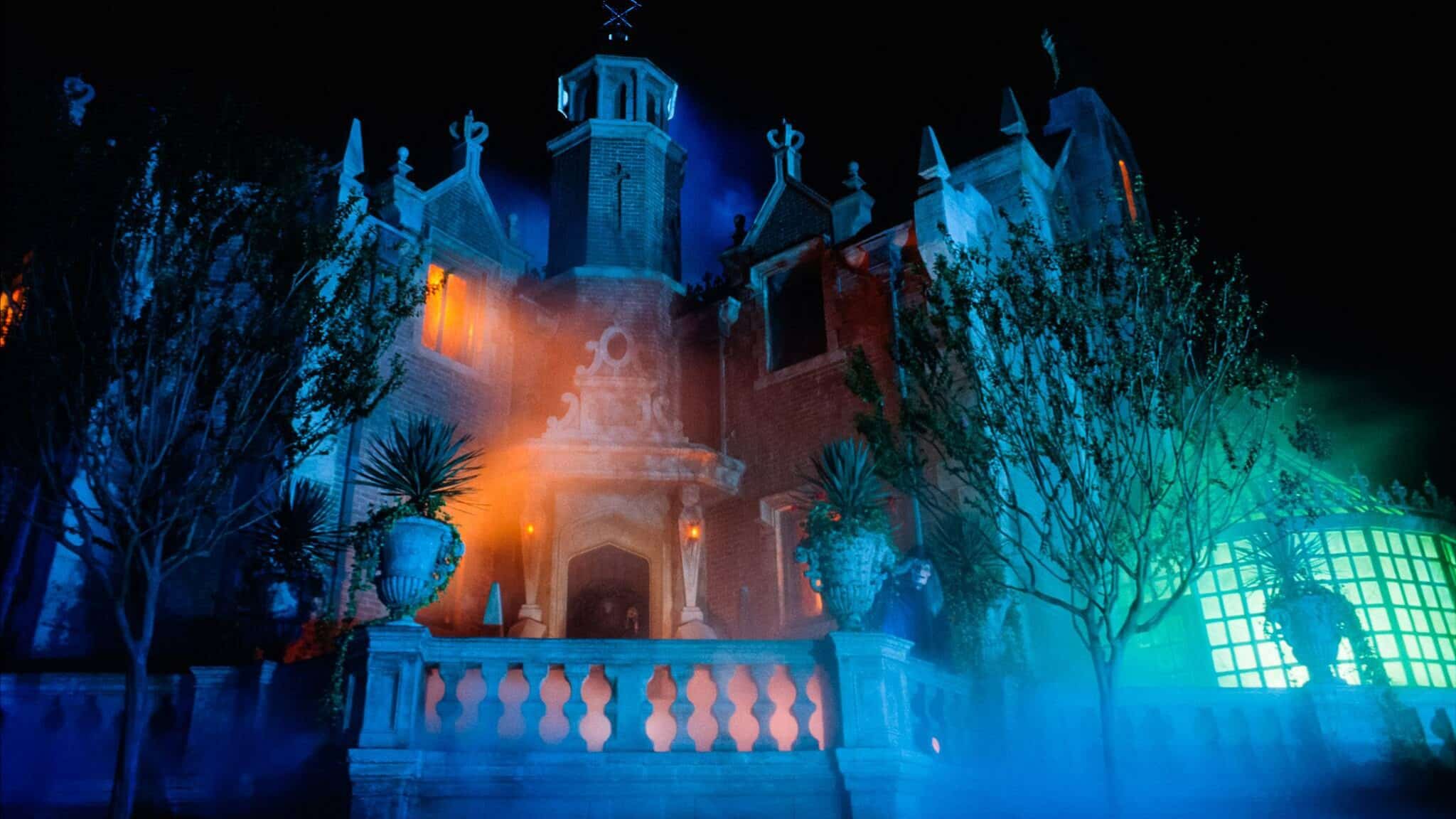 <p>Guests wind through an interactive cemetery, entering the mansion and boarding a “Doom Buggy.” Guests then spend the next 10 minutes or so receiving a guided tour through the Mansion, narrated by the infamous Ghost Host, witnessing numerous ghouls and happy haunts having a grand old time in the afterlife throughout the attraction's various scenes.</p> <p>The Haunted Mansion may be dark or intimidating for younger riders, but it remains a ceaselessly interesting ride that stands apart.</p> <p>Like the Tower of Terror, you know the minute you see that Gothic mansion standing alone in Liberty Square or hear the opening narration by the Ghost Host in the Stretching Room that you're in for a one-of-a-kind ride.</p>