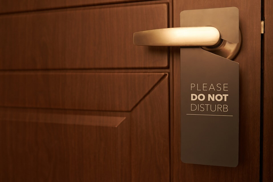 <p>If you've been on a cruise ship before, you notice that the doors on the rooms don't actually lock.</p> <p>This is on purpose, of course. In case of an emergency, the crew needs to be able to get anywhere without obstruction. The "Do Not Disturb" sign is your only hope for privacy.</p>