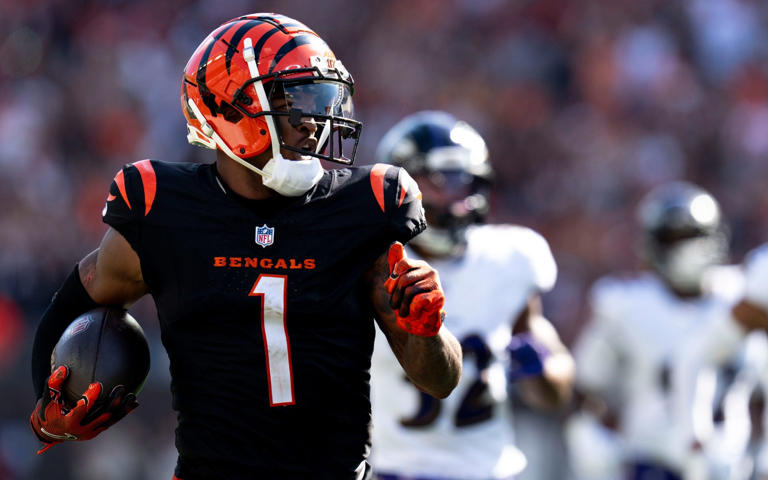 Cincinnati Bengals wide receiver Ja'Marr Chase (1) scores a touchdown on a reception in the fourth quarter of the NFL game at Paycor Stadium in Cincinnati on Sunday, Oct. 6, 2024.