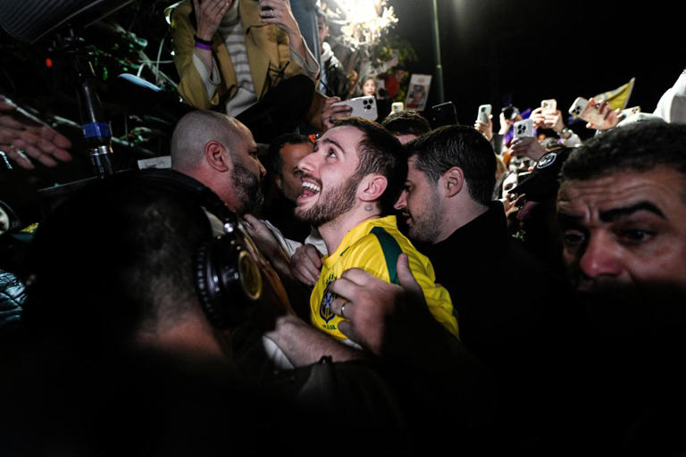 A crowd in Herzliya, Israel, welcomed former hostage Omer Shem Tov on Saturday after he was discharged from a hospital.