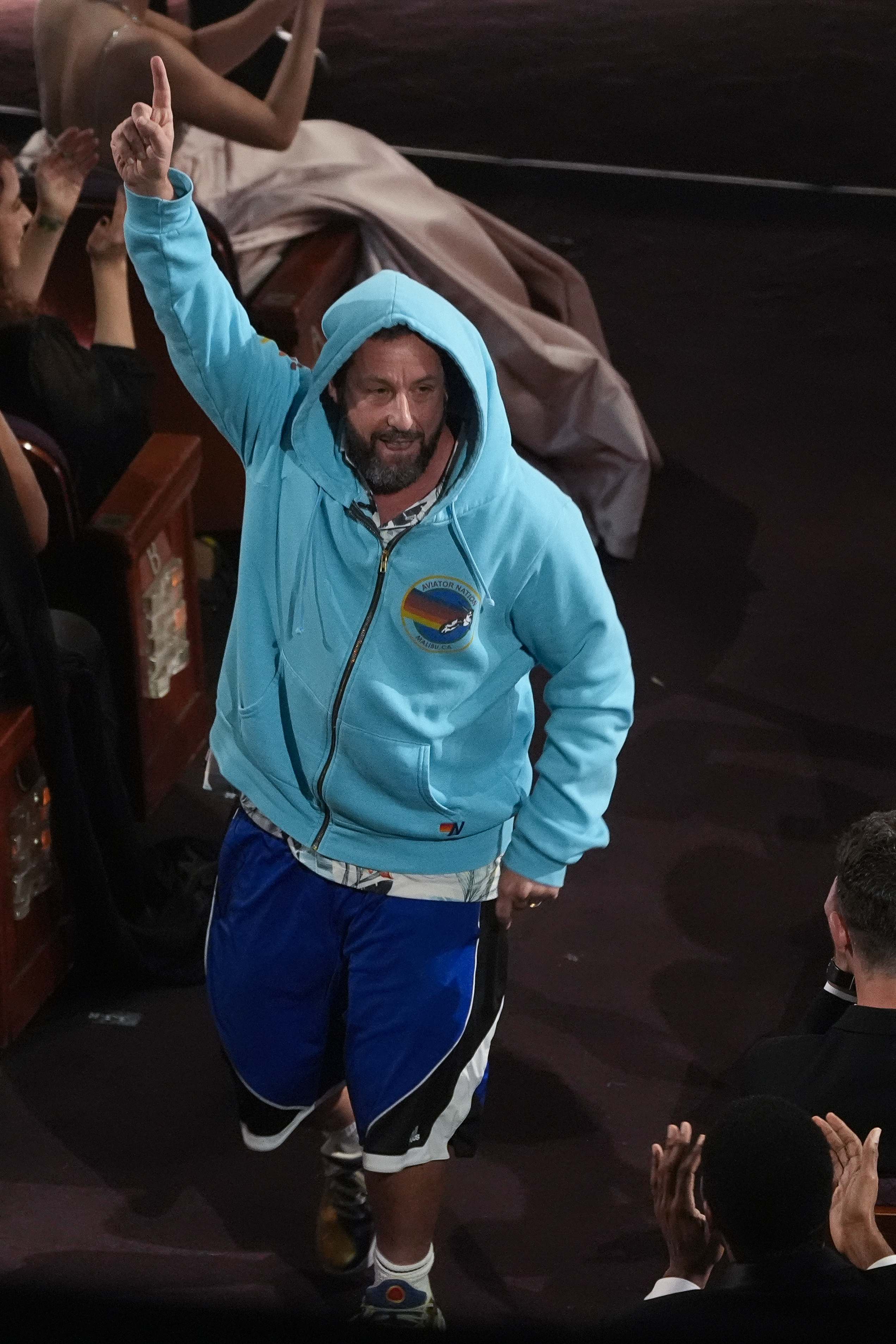 Adam Sandler crashes Conan O’Brien’s Oscars 2025 monologue in a hoodie