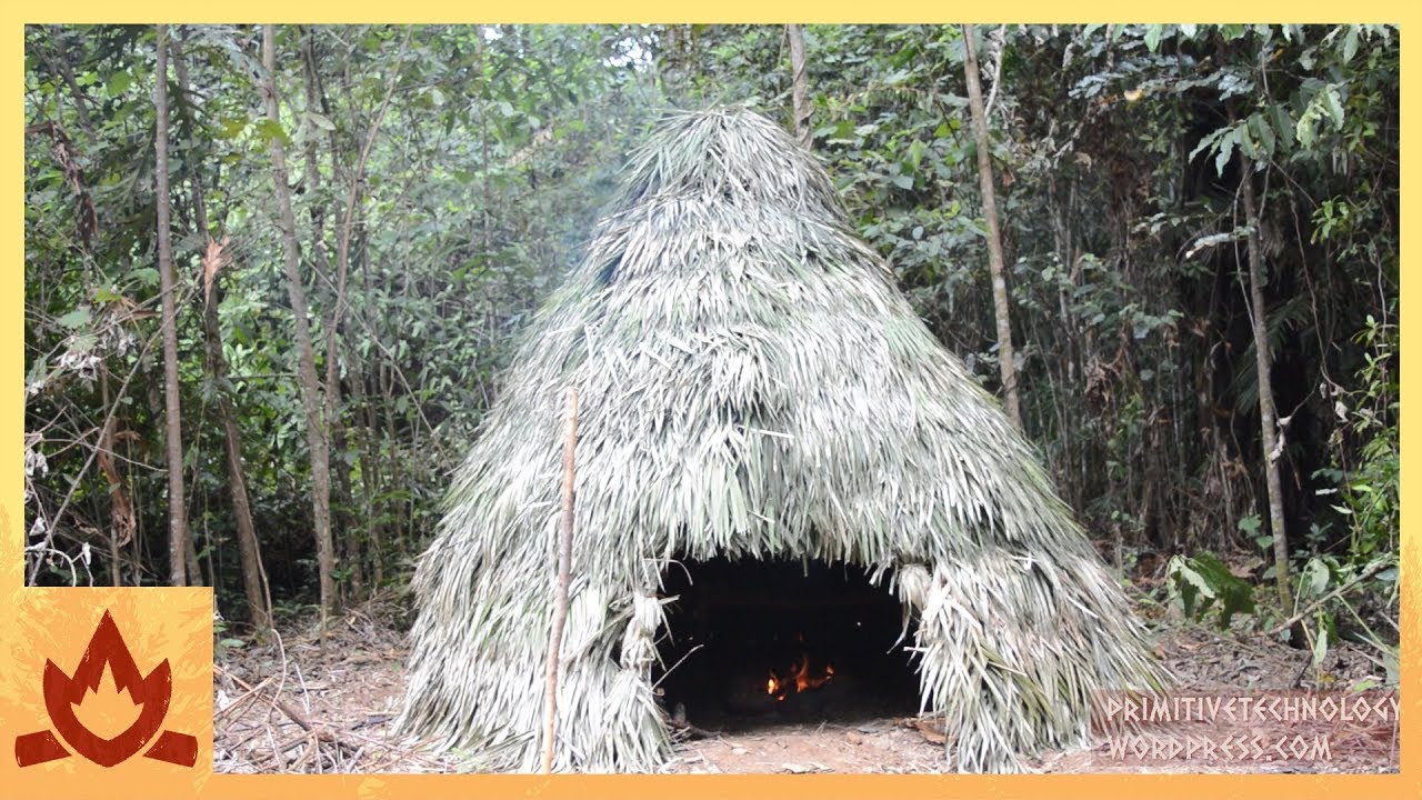 Making a shelter, fire, and bed from scratch in a rainforest