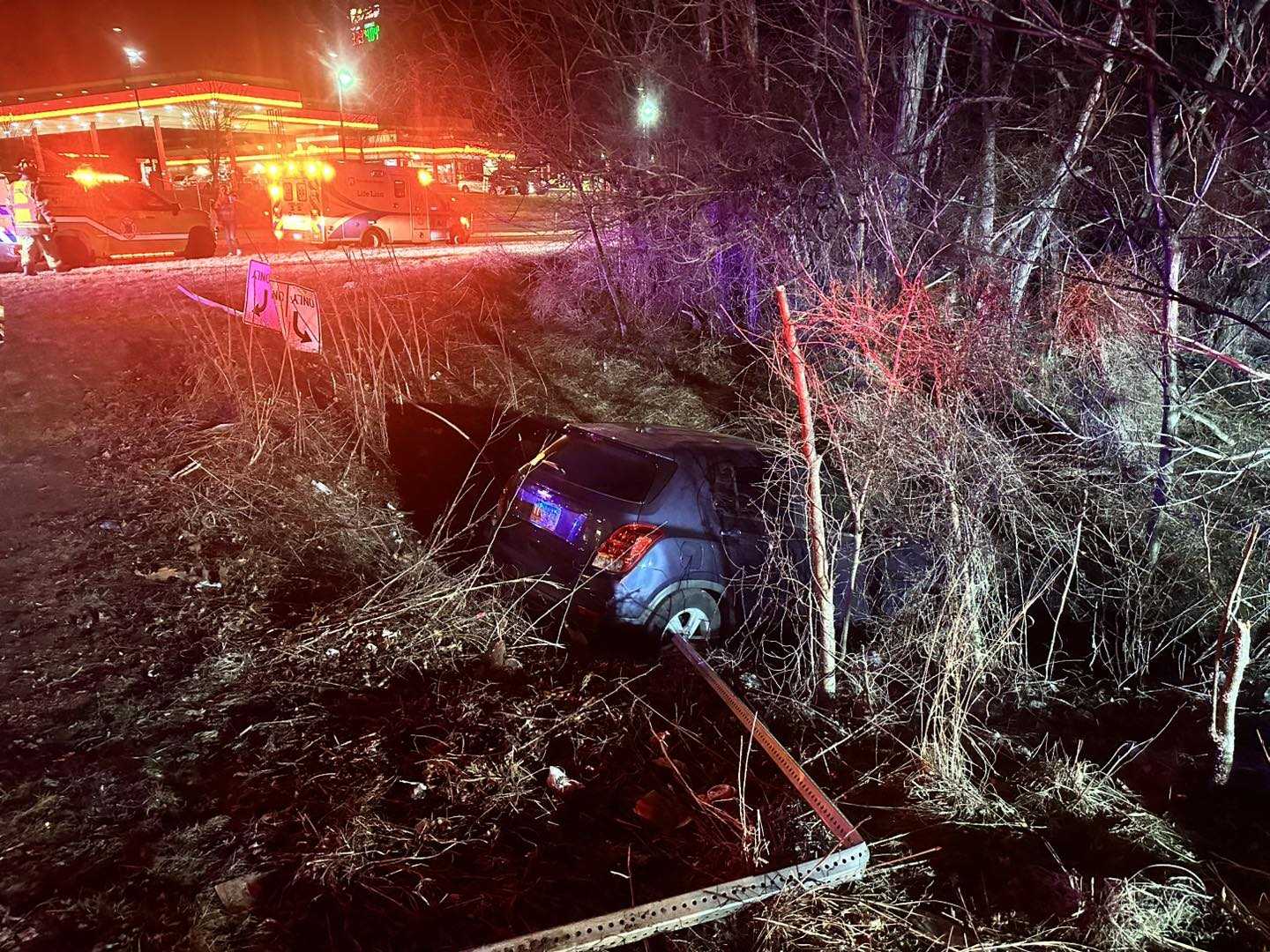 2 people injured after vehicle crashes down embankment