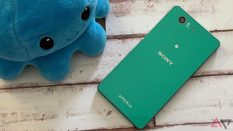 Sony Xperia Z3 Compact sitting next to a plush