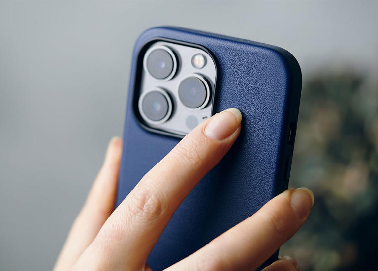 person-holding-iphone