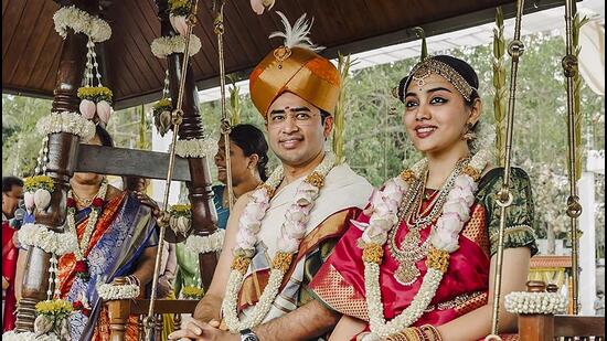 BJP MP Tejasvi Surya and Carnatic classical singer Sivasri Skandaprasad during their wedding ceremony, in Bengaluru.