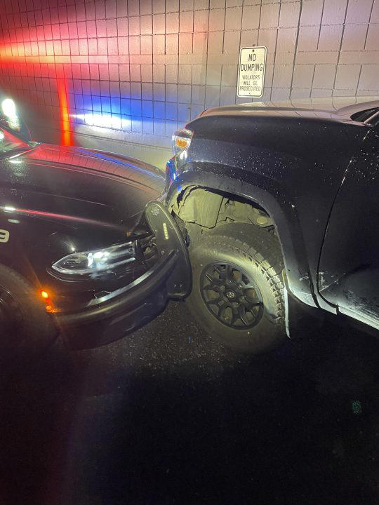 Suspect tried to flee by ramming stolen truck into a patrol car, police say