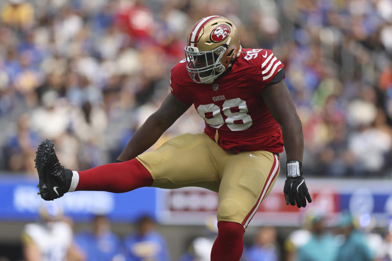 FILE - San Francisco 49ers defensive tackle Javon Hargrave (98) celebrates after sacking Los Angeles Rams quarterback Matthew Stafford during the first half of an NFL football game, Sept. 22, 2024, in Inglewood, Calif. (AP Photo/Ryan Sun, File)