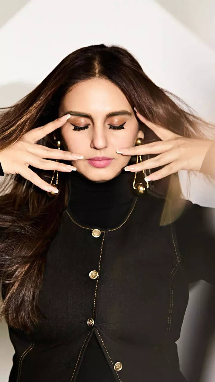 Huma Qureshi stuns in an edgy all-black ensemble with power dressing