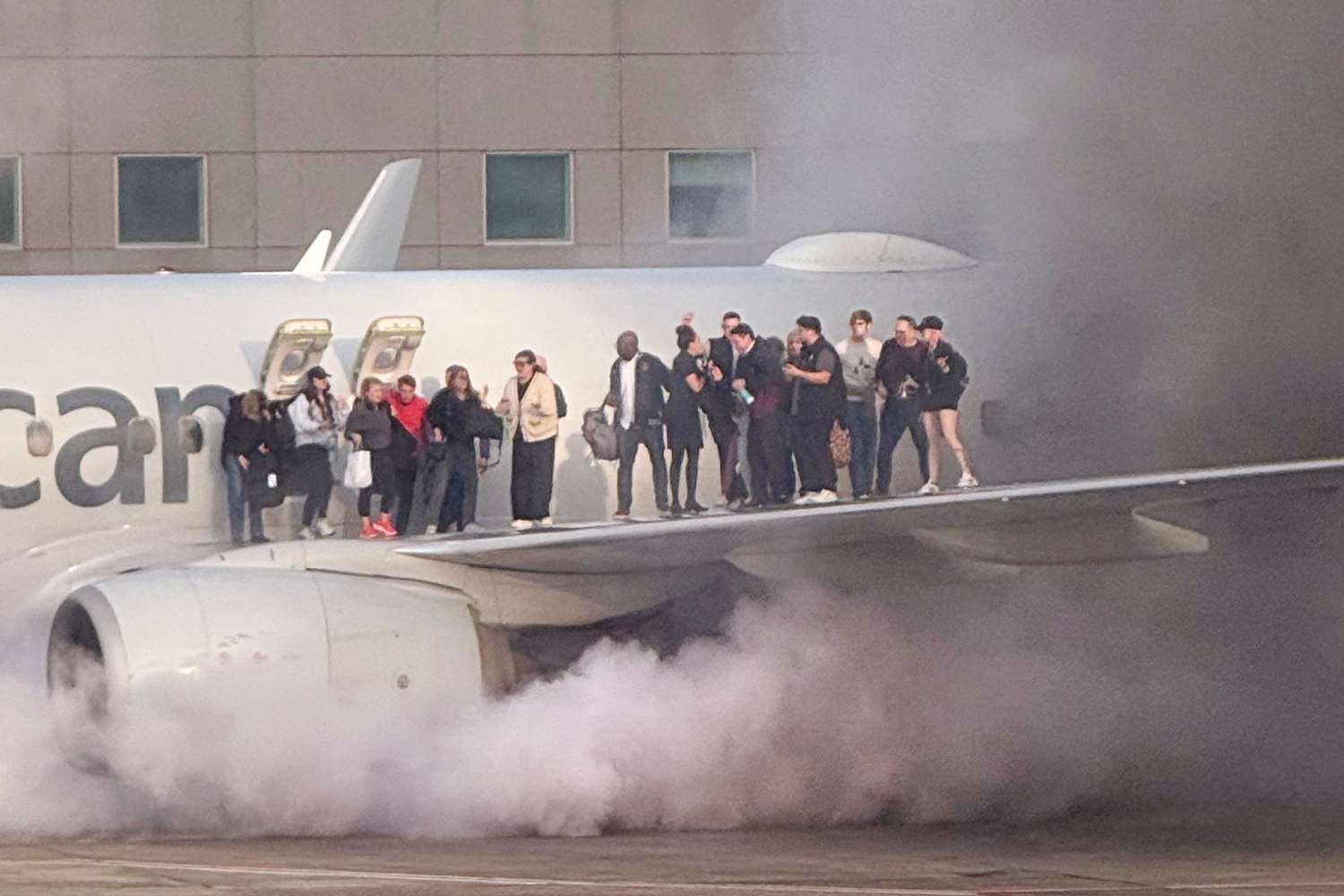 American Airlines Passengers Evacuated After Plane Catches on Fire at