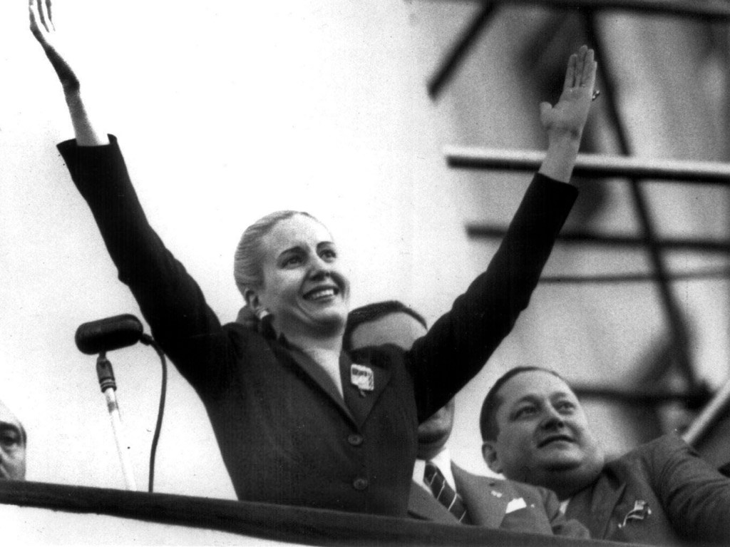 Maria Eva Duarte de Peron, waves to supporters in Buenos Aires Oct. 17, 1951. AP