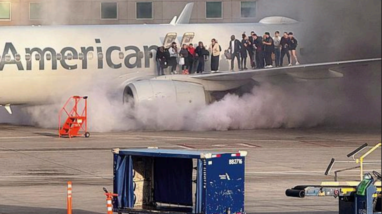 Passengers evacuate onto wing as American Airlines plane catches fire in  Denver