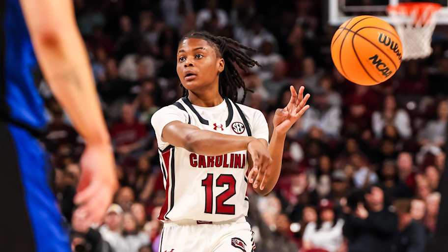 Mar 2, 2025; Columbia, South Carolina, USA; South Carolina Gamecocks guard MiLaysia Fulwiley (12) makes a no-look pass against the Kentucky Wildcats in the first half at Colonial Life Arena. Mandatory Credit: Jeff Blake-Imagn Images | Jeff Blake-Imagn Images