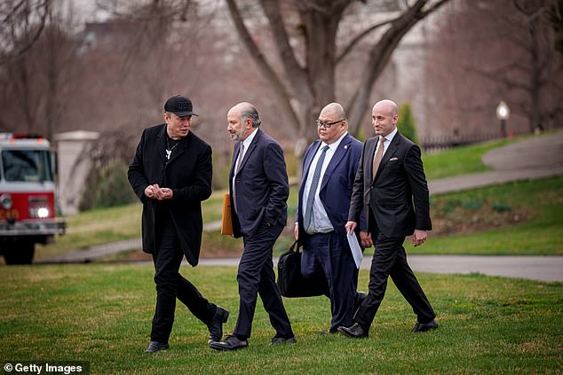 White House Senior Advisor, Tesla and SpaceX CEO Elon Musk, Commerce Secretary Howard Lutnick, White House Communications Director Steven Cheung, and White House Deputy Chief of Staff Stephen Miller walk towards Marine One on the South Lawn to join U.S. President Donald Trump
