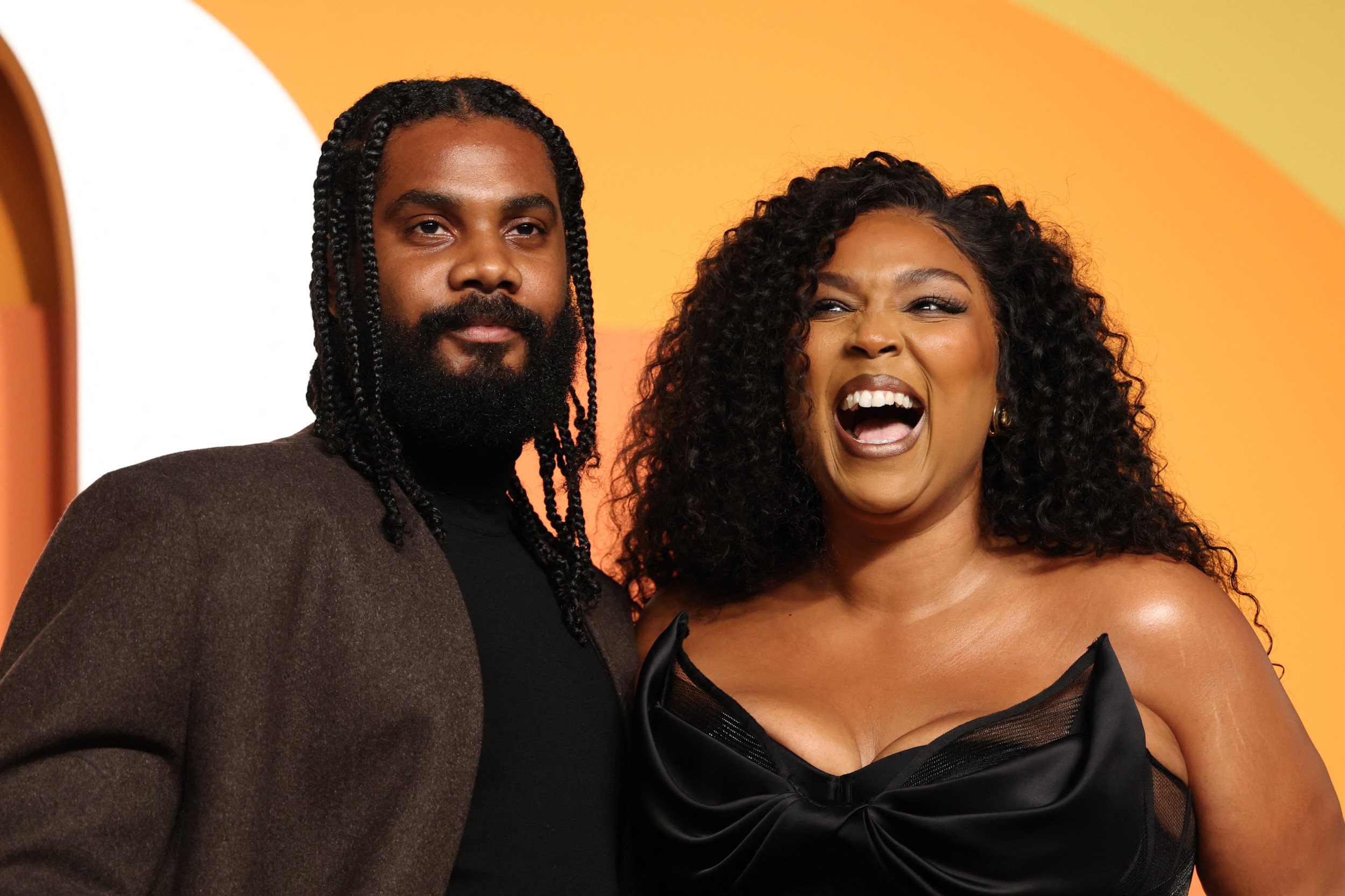 Lizzo Showcases Weight Loss Transformation With Boyfriend at Oscars Outing