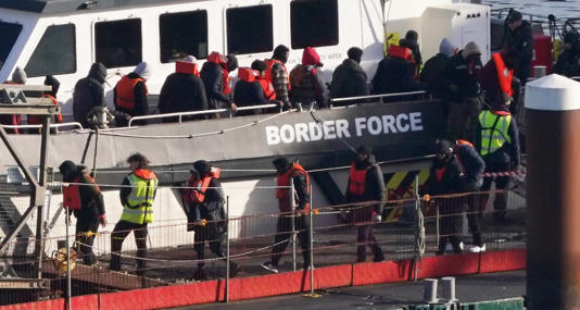 A group of people thought to be migrants are brought in to Dover, Kent, from a Border Force vessel - PA Wire