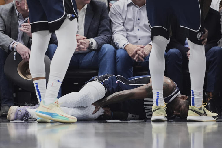 Mavs star Kyrie Irving has a torn ACL and is out for the season, AP ...