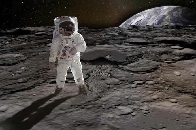 Astronaut On The Moon. Elements Of This Image Furnished By Nasa