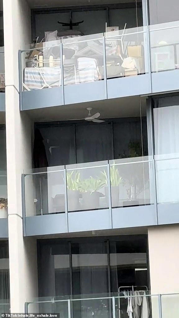 Aussie blasted for 'dangerous' balcony act ahead of Cyclone Alfred