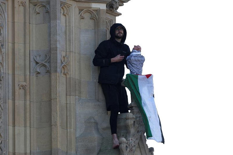 Man climbs London's Big Ben tower waving Palestinian flag