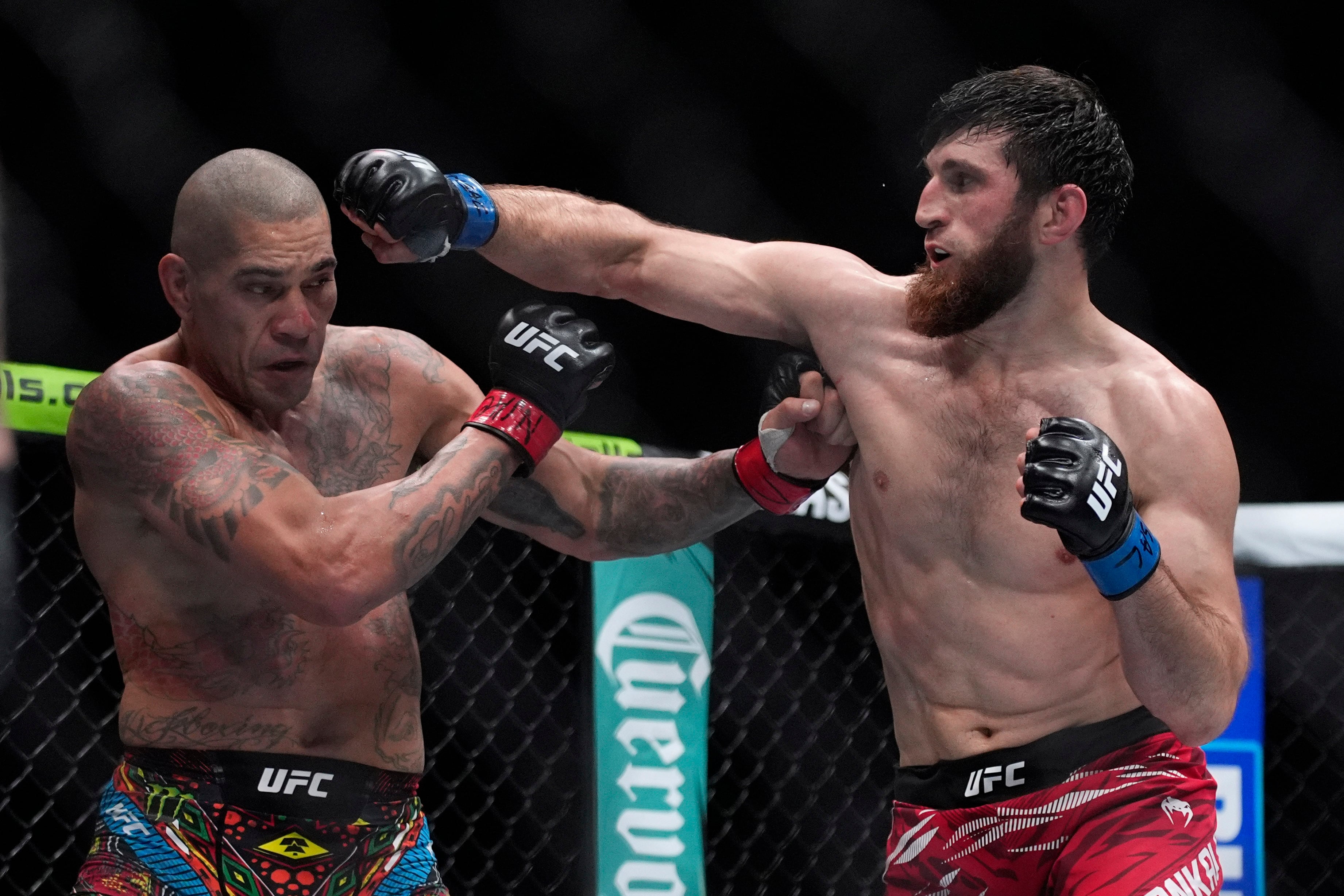 Alex Pereira, left, fights Magomed Ankalaev during UFC 313. AP