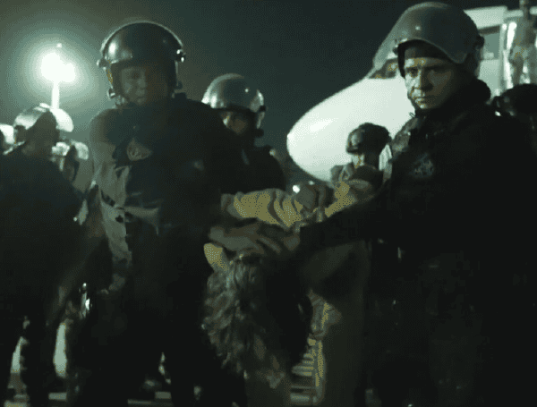 VIDEO: Gangsters Grounded: 200+ Deported Tren de Aragua Suspects Arrive At El Salvador’s Mega-Prison