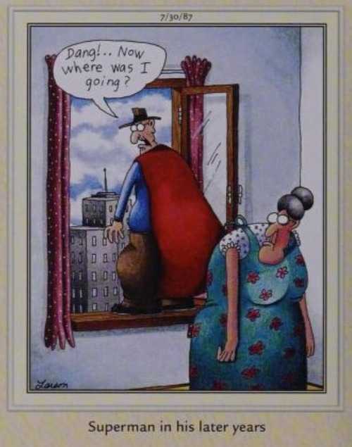 An old Superman stands on a window ledge.