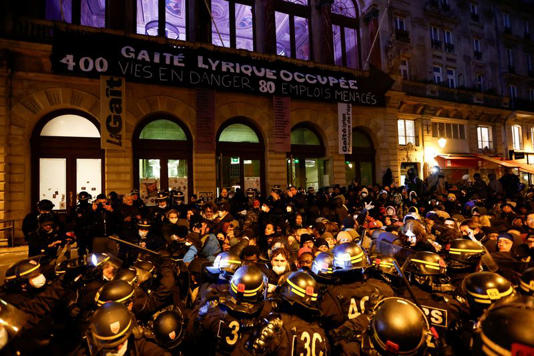 People gather against police eviction of migrants from the Gaite Lyrique theatre after more than three months of their occupation, in Paris, France, March 18, 2025. REUTERS/Abdul Saboor