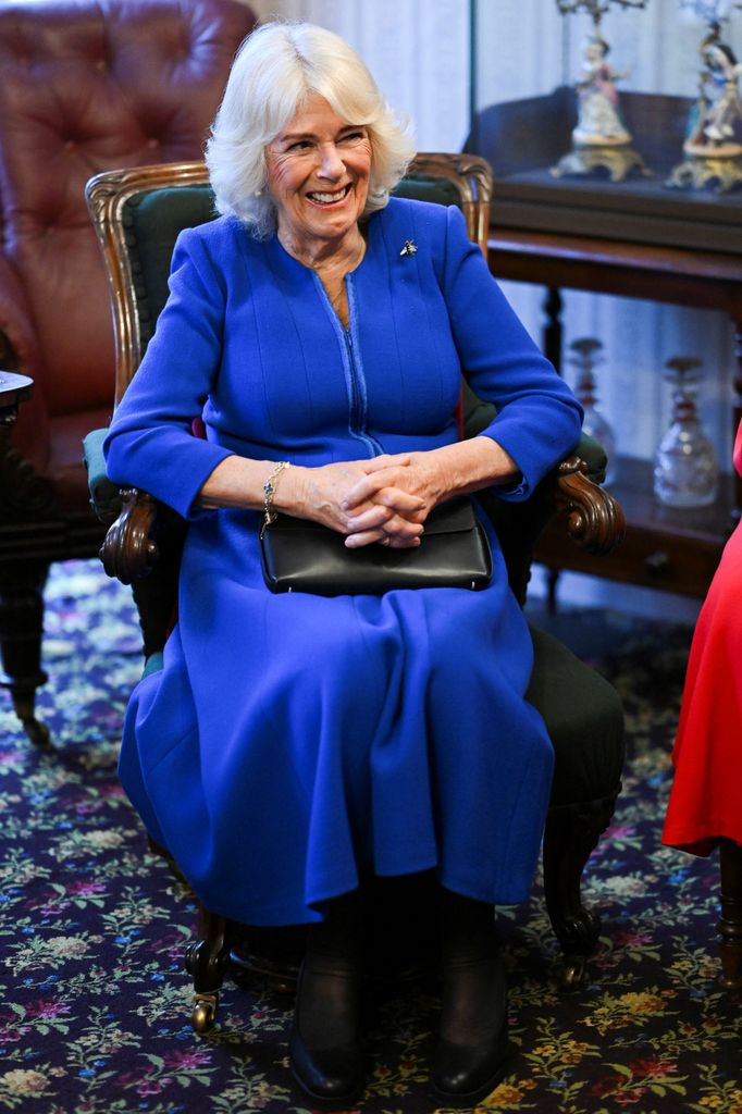 Queen Camilla's hidden one-word tribute to Charles as she steps out solo