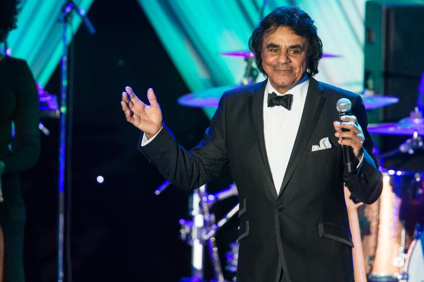 Singer Johnny Mathis is retiring from touring, citing age and 'memory ...