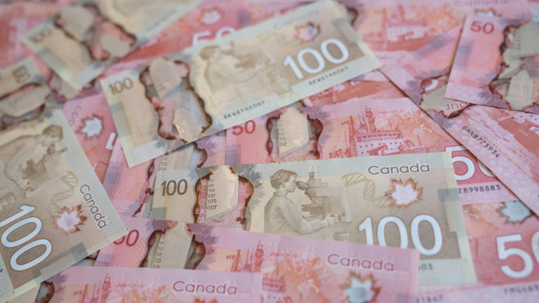 Canadian dollar falls near 70¢ US as Canada–US interest-rate gap widens ...