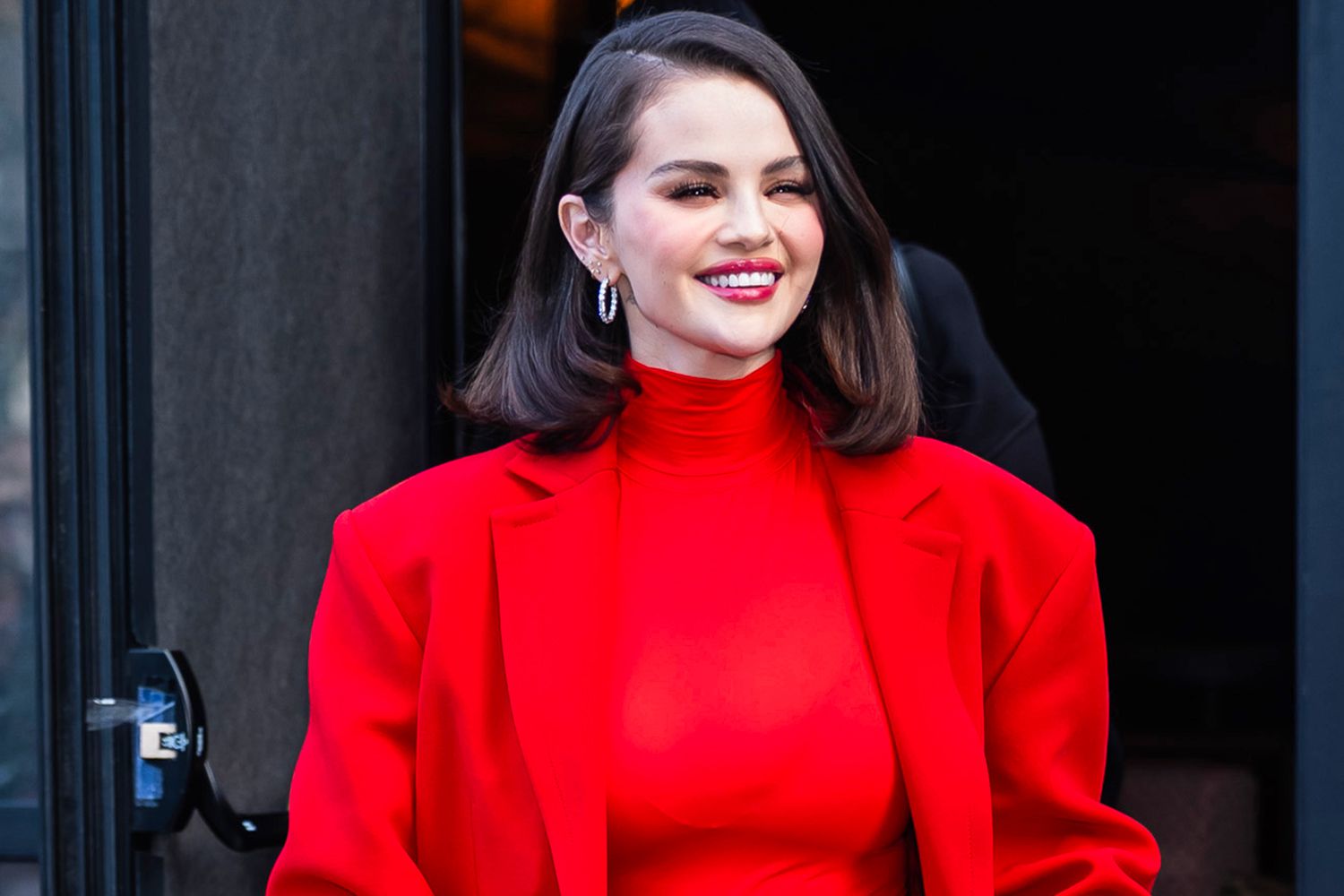 Selena Gomez Looks Radiant in Red While Buying Fans Her Brand's New(00)