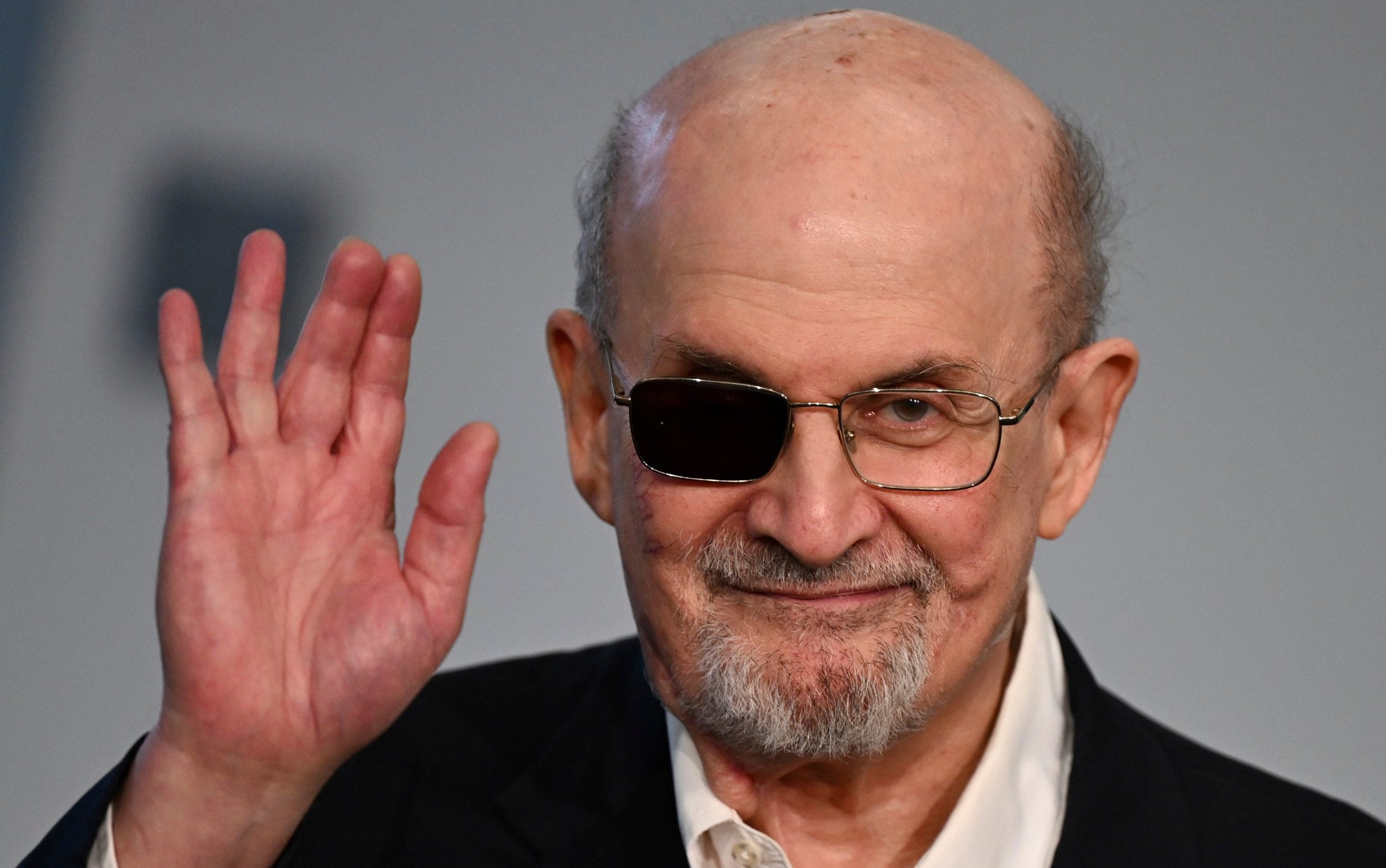 Sir Salman Rushdie was stabbed more than a dozen times in front of a live audience in 2022 - Arne Dedert/AP