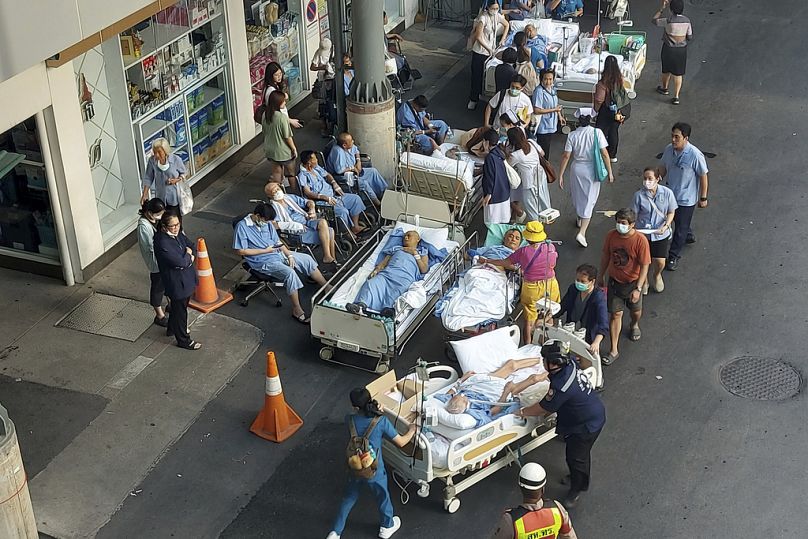 Patients are evacuated outdoors at a hospital after a 7.7 magnitude earthquake in Bangkok, Thailand, Friday, March 28, 2025 Tadchakorn Kitchaiphon/Copyright 2025 The AP. All rights reserved