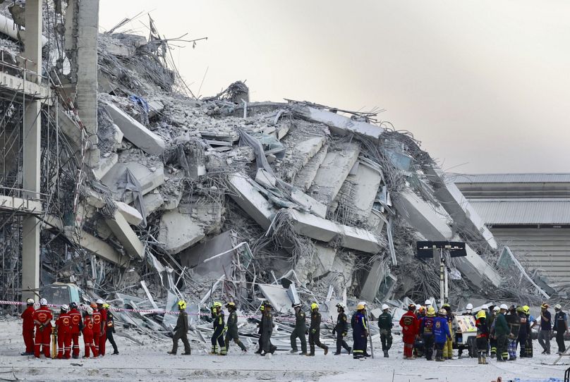 Rescuers work at the site a high-rise building under construction that collapsed after a 7.7 magnitude earthquake in Bangkok, Thailand, Friday, March 28, 2025 Wason Wanichakorn/Copyright 2025 The AP. All rights reserved