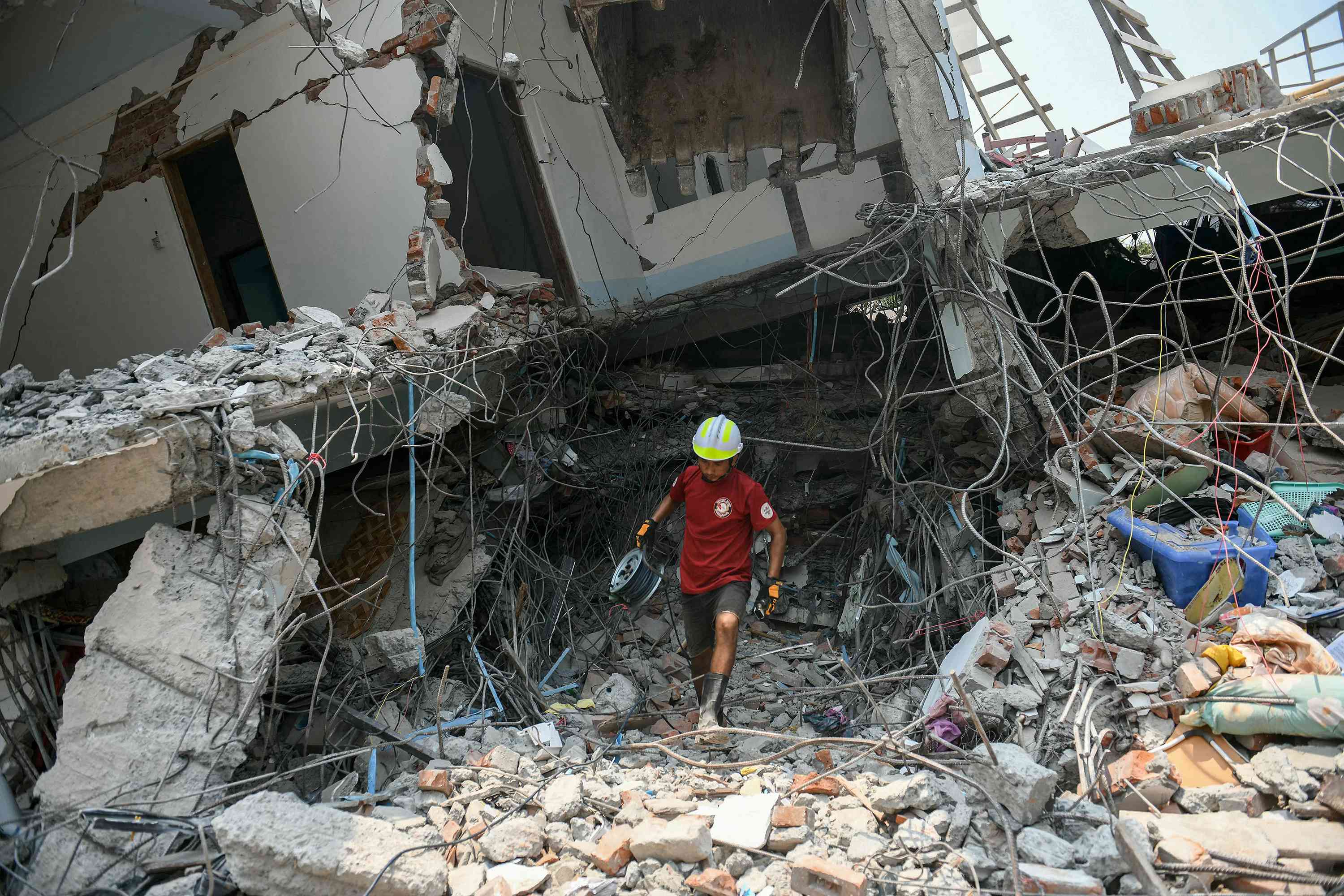 Woman Rescued from Under Building Over 90 Hours After Deadly Myanmar