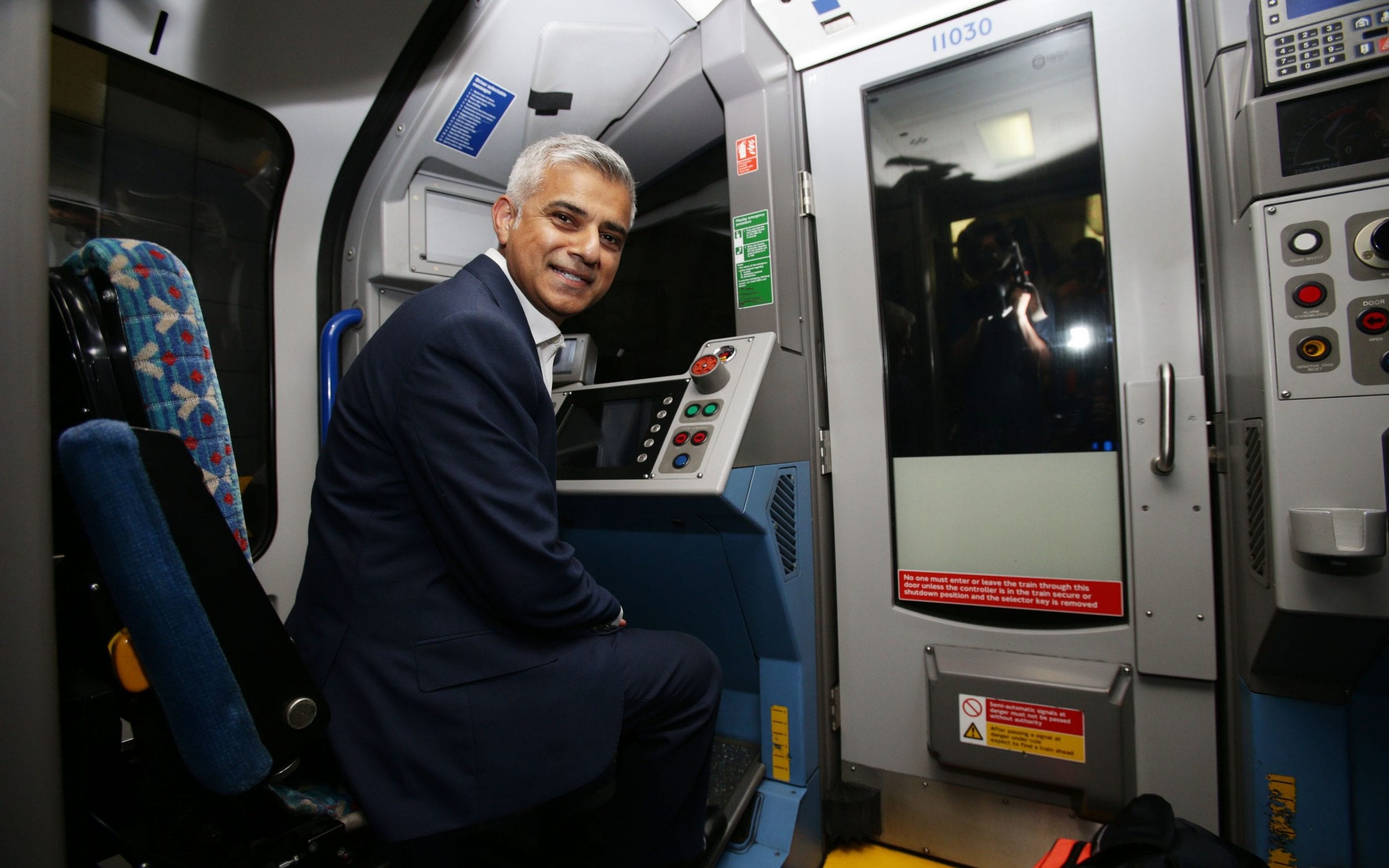 Sir Sadiq Khan in the driver's carriage of a Tube train