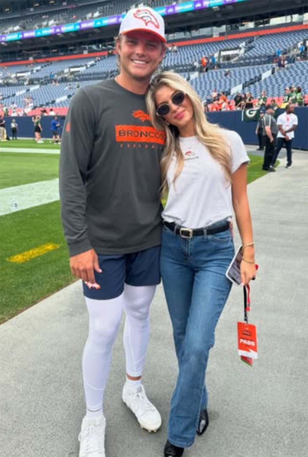 Zach Wilson joined by fiancée Nicolette Dellanno at Dolphins signing