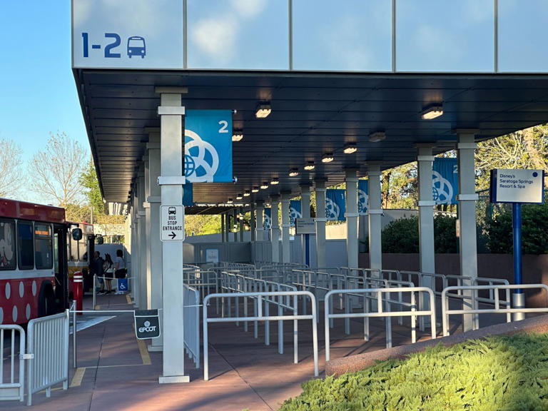 PHOTOS: Construction Walls and Scrim Up at EPCOT Bus Stop Area