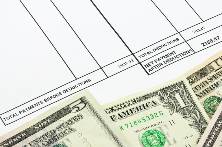 Having your wages garnished by a debt collector can have a big impact on your finances, especially if you weren't expecting it. / Credit: Getty Images