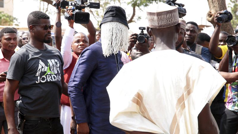 In this photo taken Friday, Jan. 18, 2019, Anas Arimiyaw Anas, investigative journalist, centre,