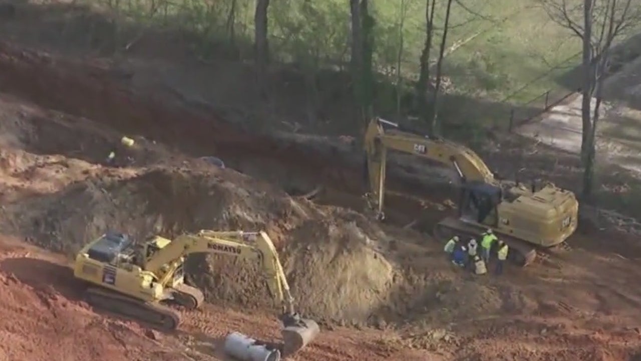 Workers briefly trapped in collapsed trench in Cobb County