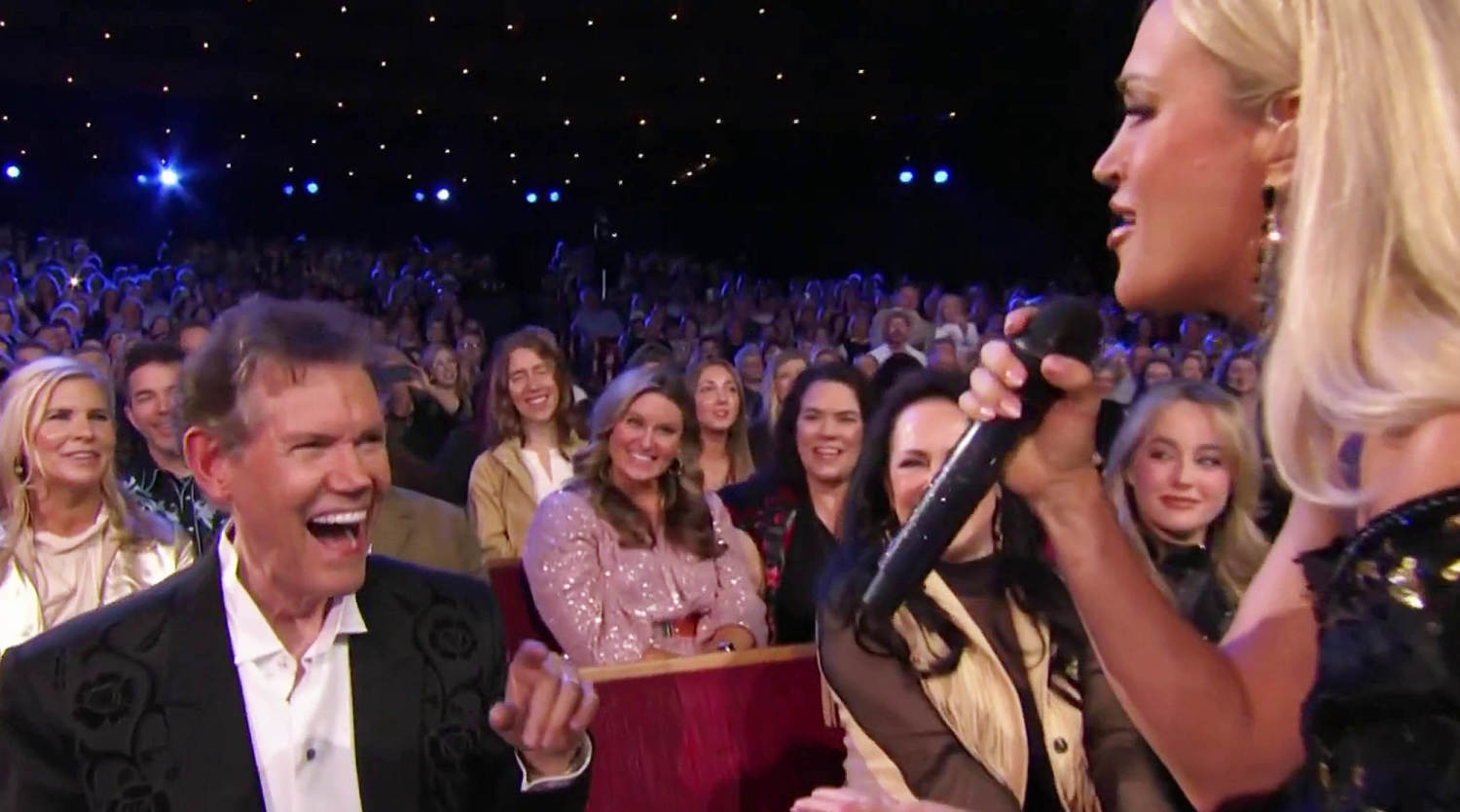 Carrie Underwood and Randy Travis move country fans to tears during 'Opry  100' special