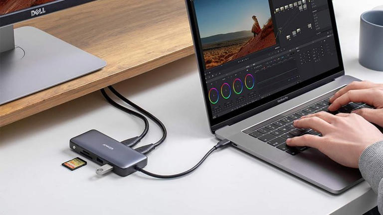 You might need a hub or dock for the laptop-to-desktop switch. Anker