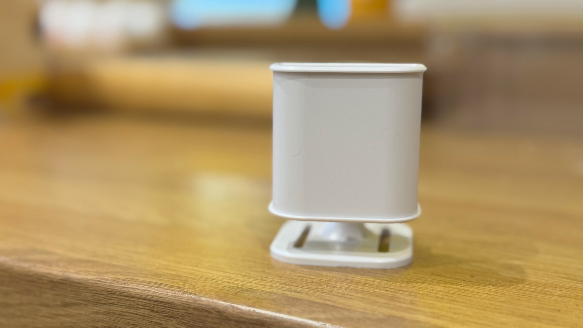 Everything Presence Lite mmWave presence sensor on a work surface.