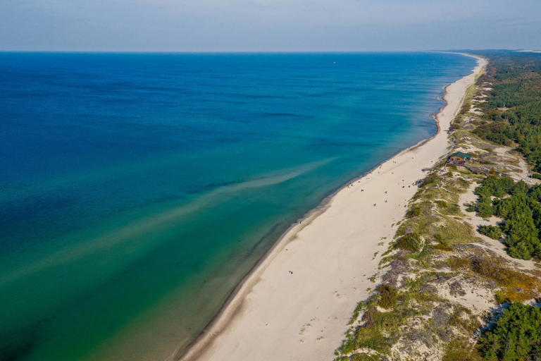 Europas längsten Strand teilen sich gleich zwei Länder