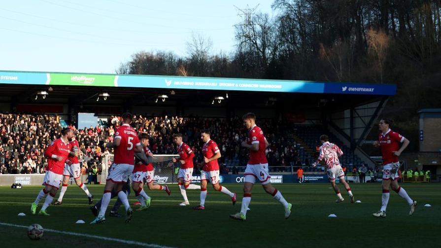 Wrexham Criticized for Air Travel to Away Match