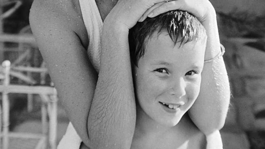 Grace Kelly with a young Prince Albert in Jamaica | Getty Images