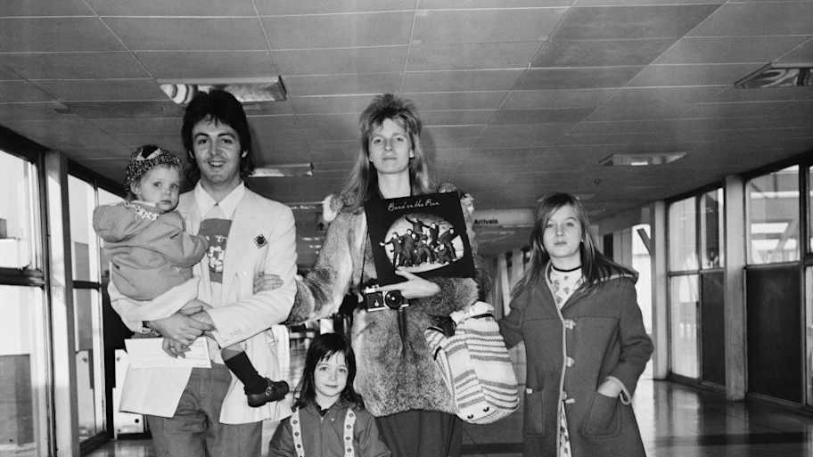 Paul McCartney on his way to Jamaica with then wife Linda and their children Stella, Mary and Heather | Daily Express/Hulton Archive/Getty Images